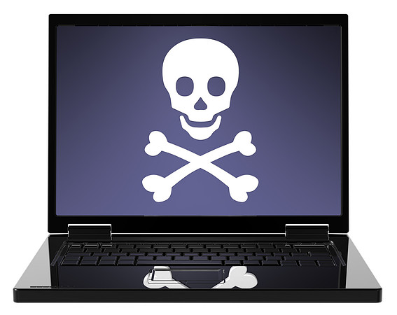 Skull and crossbones on the laptop screen.